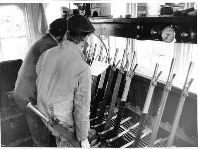 Fitting the interlocking in the ex Ais Gill Signal Box at Butterley. Sept 1986