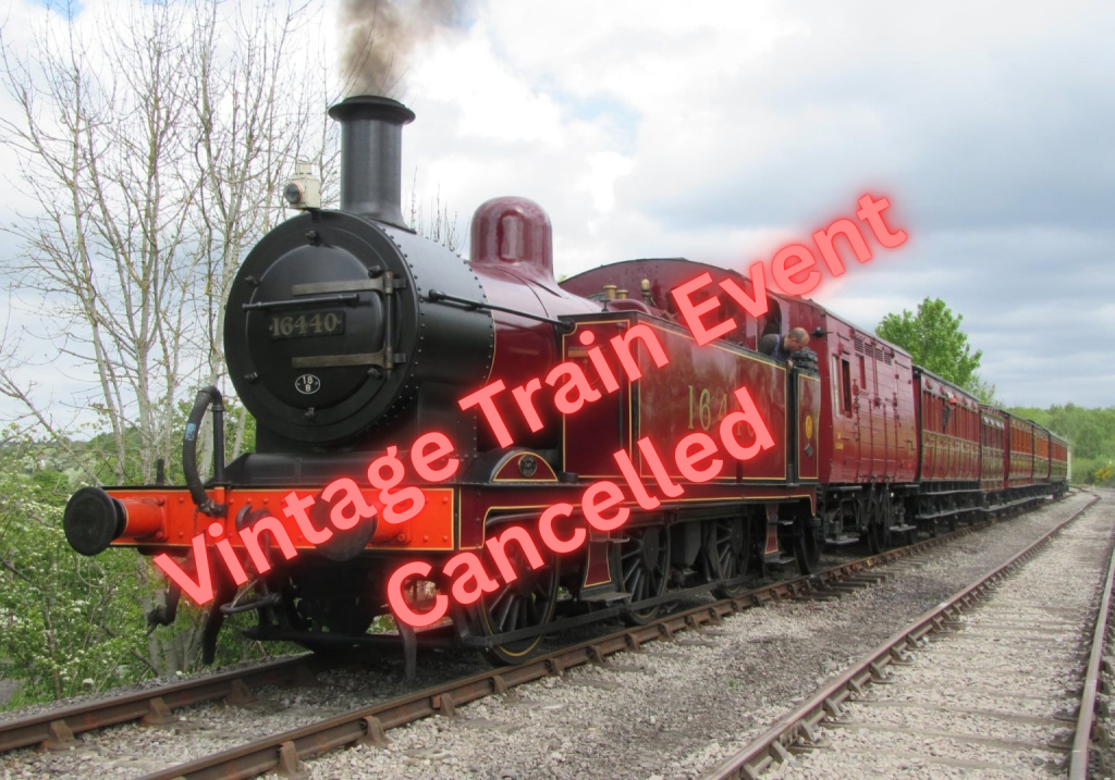 Vintage steam locomotive with red carriages on a rail line, steam rising from the smokestack; watermark reads'Vintage Train Event Cancelled' across the image.
